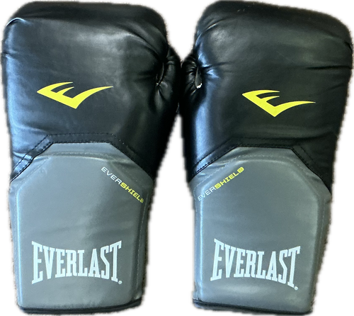 Vist Large View of Product Image Which is Used Everlast Boxing Gloves None Senior