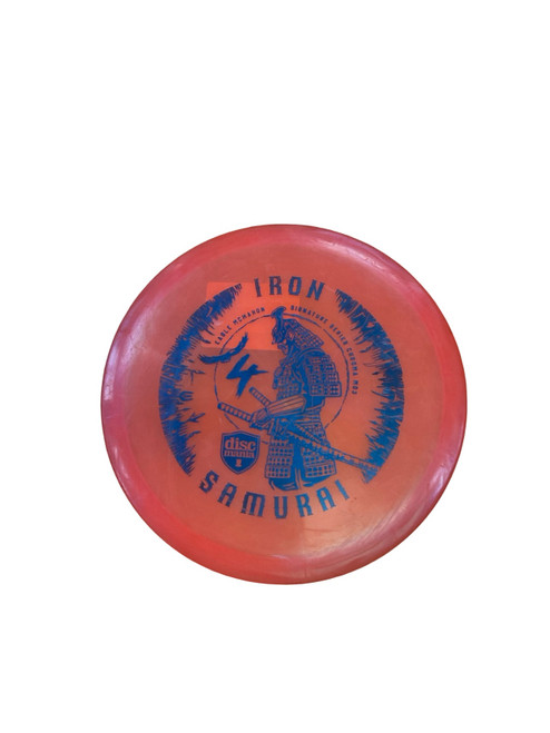 Vist Large View of Product Image Which is Used Discmania CHROMA C-LINE MD3 IRON SAMURAI Disc Golf Mid Range Orange 177g