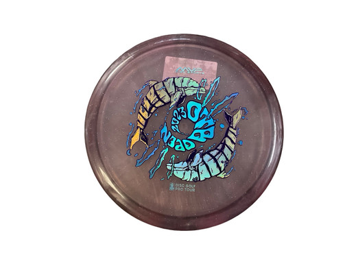 Vist Large View of Product Image Which is Used MVP PRISM PROTON ECHO OTB OPEN 2023 Disc Golf Mid Range Purple 178g