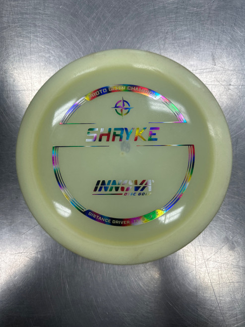 Vist Large View of Product Image Which is Used Innova PROTO GLOW CHAMPION SHRYKE Disc Golf Driver None
