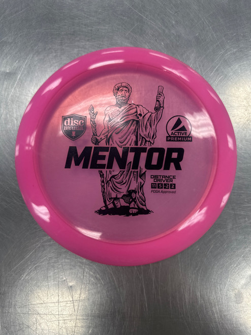 Vist Large View of Product Image Which is Used Discmania ACTIVE PREMIUM MENTOR Disc Golf Driver Neon Pink