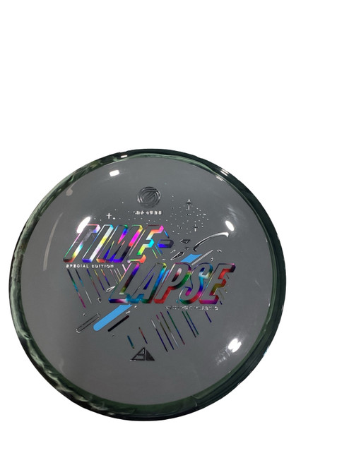 Vist Large View of Product Image Which is Used Axiom TIME LASPE Disc Golf Driver Grey