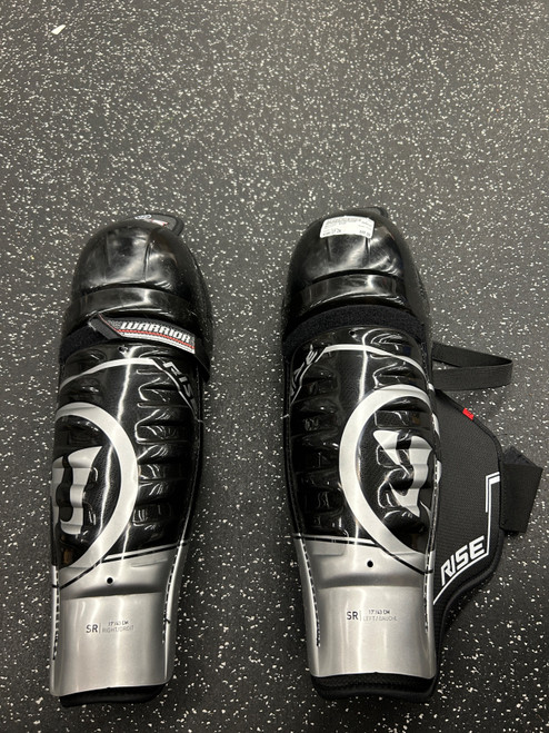 Vist Large View of Product Image Which is Used Warrior RISE Senior Shin Guards Black 17"