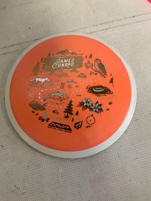 Vist Large View of Product Image Which is Used MVP TRAIL Disc Golf Driver Orange 162g