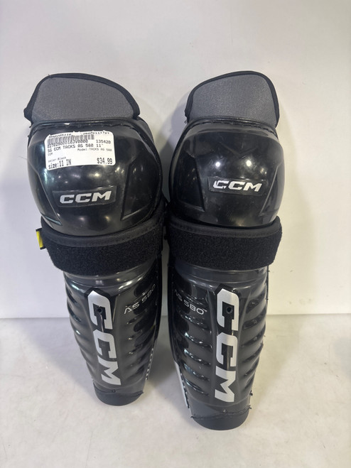 Vist Large View of Product Image Which is Used CCM TACKS AS 580 Junior Shin Guards Black 11"