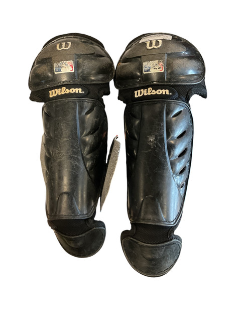 Vist Large View of Product Image Which is Used Wilson SHIN GUARDS SMALL Catchers Leg Guards Black Youth