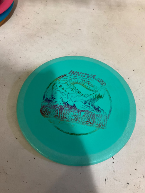 Vist Large View of Product Image Which is Used Innova CAIMAN Disc Golf Mid Range Green