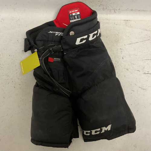 Vist Large View of Product Image Which is Used CCM JETSPEED FT485 Junior Pant Black And Red SM