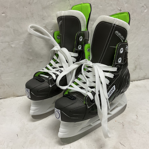 Vist Large View of Product Image Which is Used Bauer XLS Junior Hockey Skate Black And Neon Green Junior 01