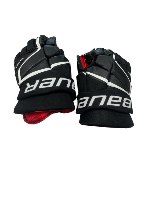 Vist Large View of Product Image Which is Used Bauer VAPOR Junior Gloves Black 12"