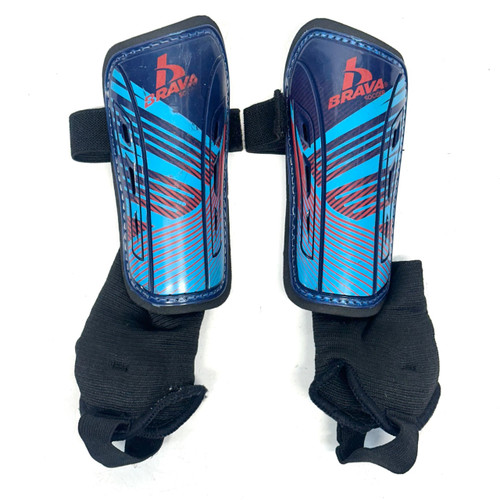 Vist Large View of Product Image Which is Used Brava Soccer Shin Guards Youth Navy Blue And Carolina Blue Youth