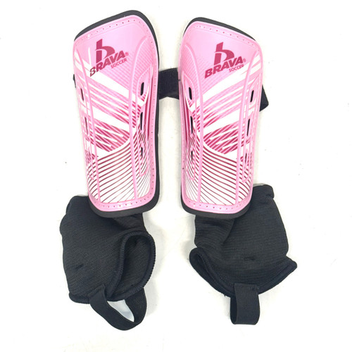 Vist Large View of Product Image Which is Used Brava Soccer Shin Guards Youth Pink Youth