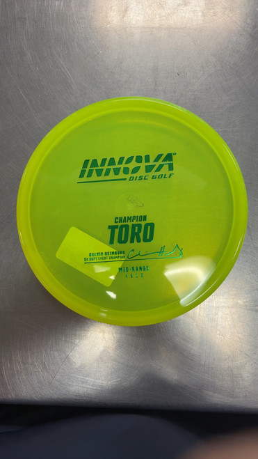 Vist Large View of Product Image Which is Used Innova CHAMPION TORO Disc Golf Mid Range Optic Yellow