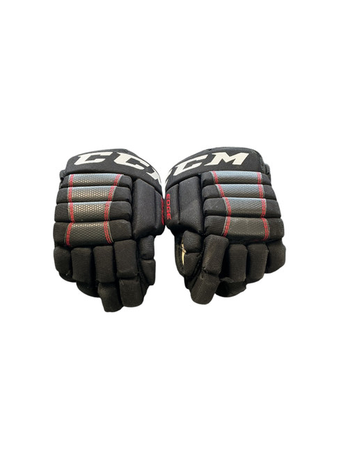 Vist Large View of Product Image Which is Used CCM EDGE Youth Gloves Black 9"