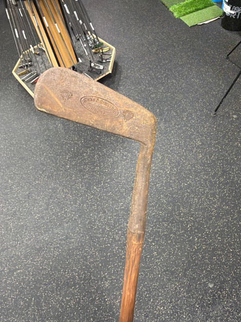 Vist Large View of Product Image Which is Used VINTAGE WOOD IRON Golf Accessory