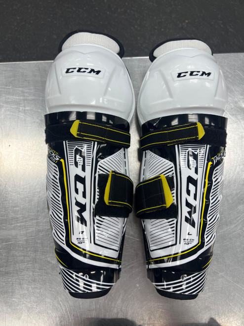Vist Large View of Product Image Which is Used CCM SUPER TACKS AS1 Junior Shin Guards White 10"