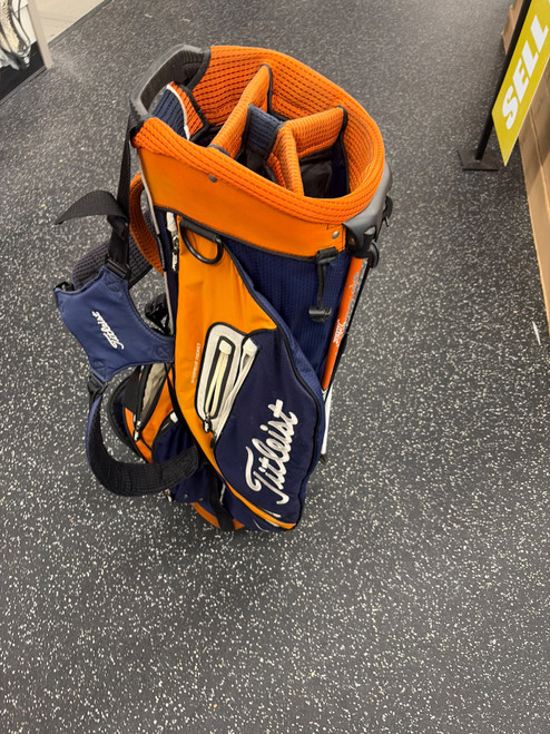 Vist Large View of Product Image Which is Used Titleist Mens Stand Bag Navy Blue And Orange