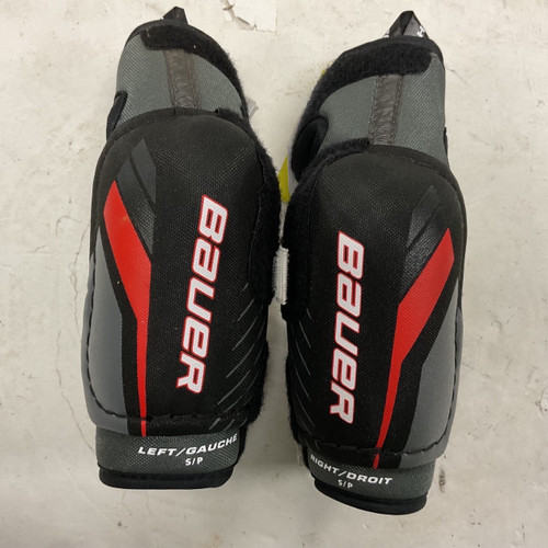 Vist Large View of Product Image Which is Used Bauer LIL SPORT Junior Elbow Pads Black And Red SM