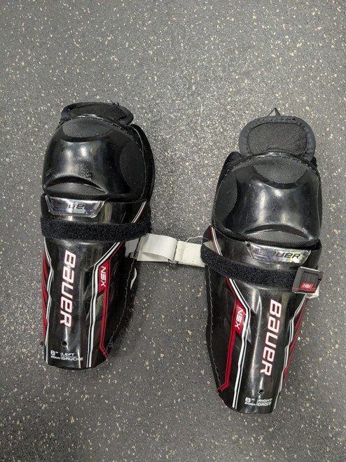 Vist Large View of Product Image Which is Used Bauer NSX Youth Shin Guards Black 8"