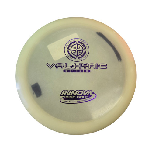 Vist Large View of Product Image Which is Used Innova VALKARIE GLOW CHAMPION DRIVER Disc Golf Driver Almond