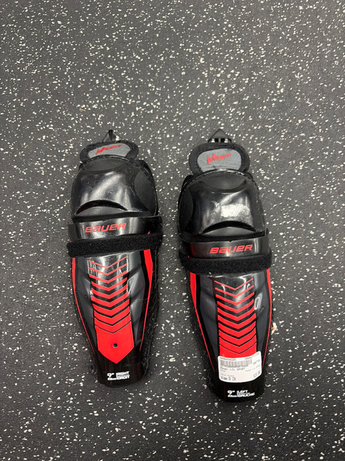 Vist Large View of Product Image Which is Used Bauer LIL SPORT Youth Shin Guards Black 9"