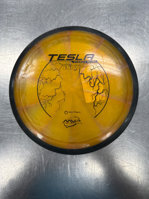 Vist Large View of Product Image Which is Used MVP PROTON TESLA Disc Golf Driver Orange