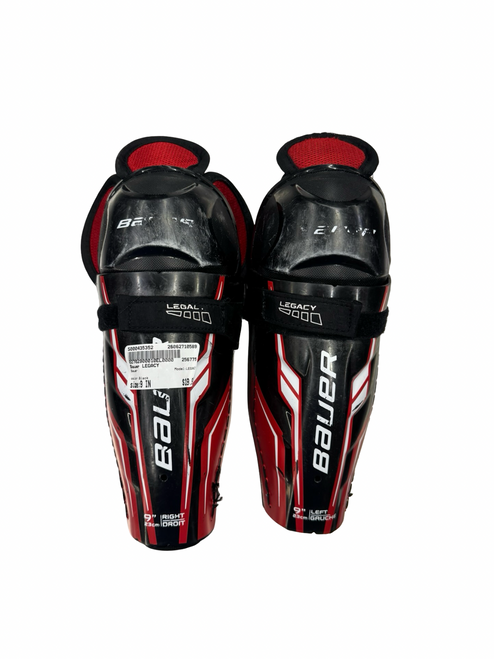 Vist Large View of Product Image Which is Used Bauer LEGACY Youth Shin Guards Black 9"