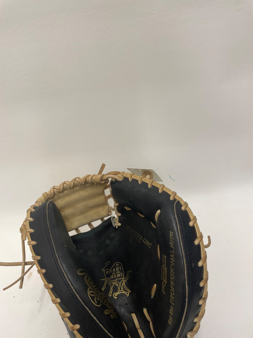 Vist Large View of Product Image Which is Used Rawlings HEART OF THE HIDE BB/SB Catchers RH Throw Black 33"