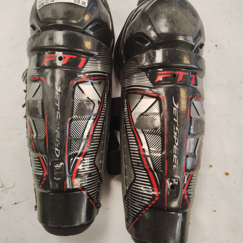 Vist Large View of Product Image Which is Used CCM JETSPEED FT1 Junior Shin Guards Black 11"