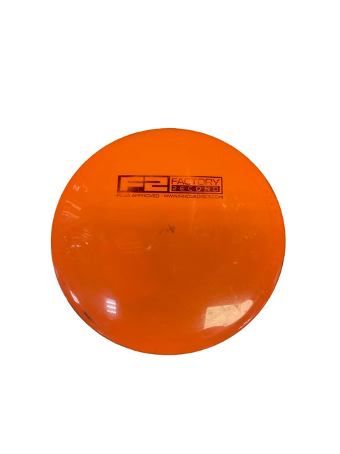 Vist Large View of Product Image Which is Used Innova FACTORY 2ND STAR TEEBIRD Disc Golf Driver Orange 174g