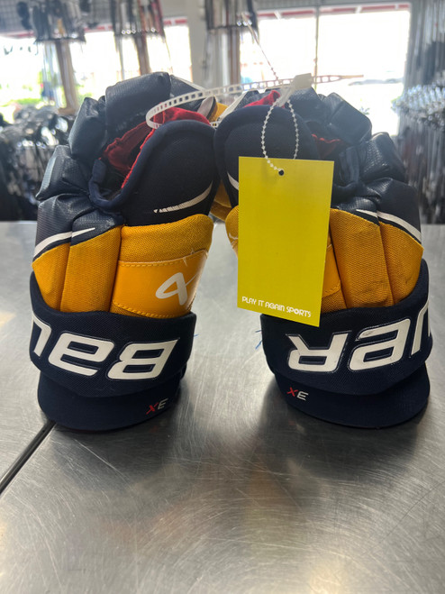 Vist Large View of Product Image Which is Used Bauer VAPOR 3X Senior Gloves Navy Blue And Yellow 14"
