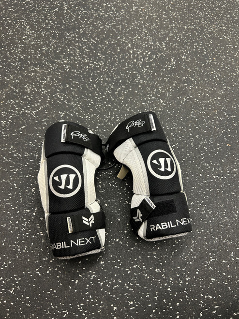 Vist Large View of Product Image Which is Used Warrior RABIL NEXT Lacrosse Arm Pads/Guards Black LG