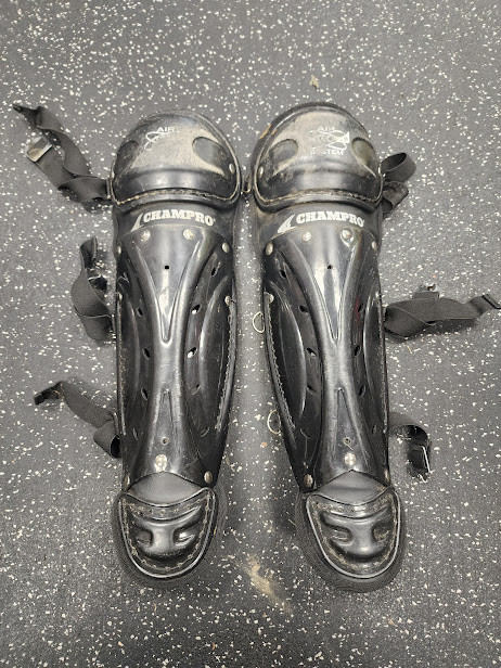 Vist Large View of Product Image Which is Used Champro YOUTH Catchers Leg Guards Black Youth