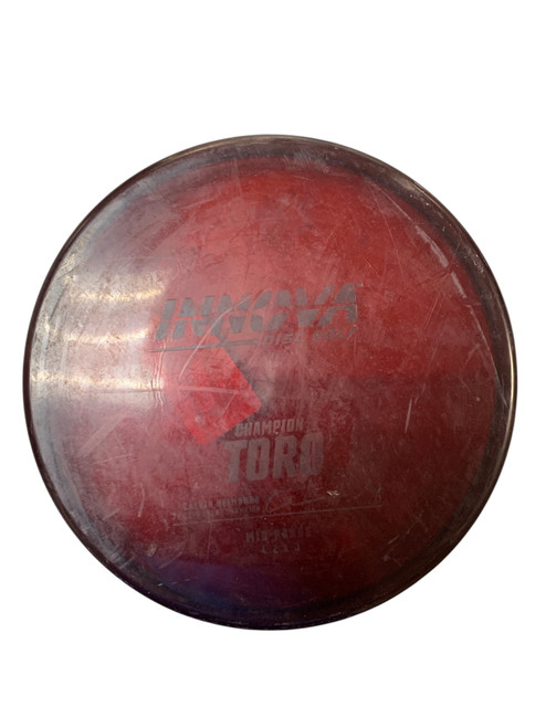 Vist Large View of Product Image Which is Used Innova CHAMPION TORO MID RED Disc Golf Mid Range Red