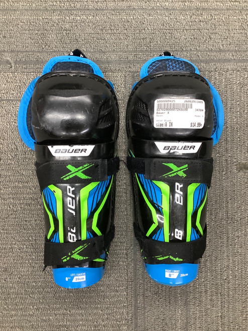 Vist Large View of Product Image Which is Used Bauer X Youth Shin Guards Black 8"