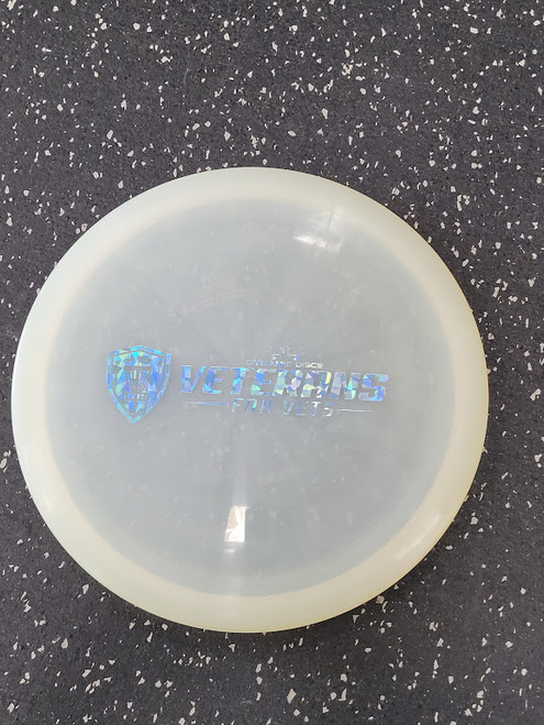 Vist Large View of Product Image Which is Used Dynamic Discs VETERANS FOR VETS Disc Golf Driver Clear