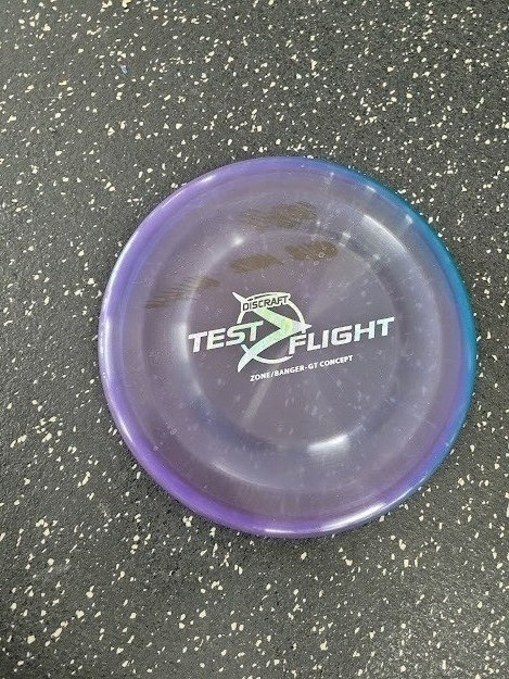 Vist Large View of Product Image Which is Used Discraft TEST FLIGHT Disc Golf Mid Range Purple