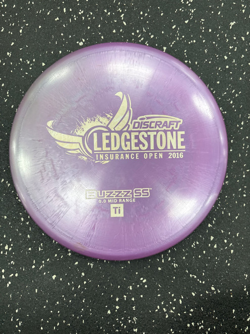Vist Large View of Product Image Which is Used Discraft TI BUZZZ SS Disc Golf Mid Range Purple