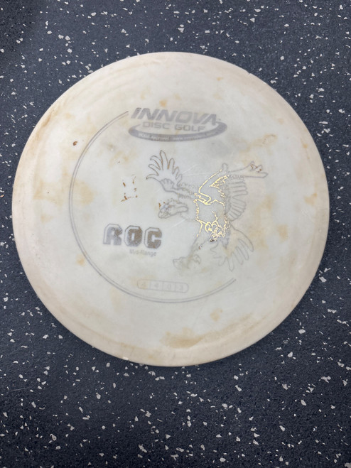 Vist Large View of Product Image Which is Used Innova DX ROC Disc Golf Mid Range White