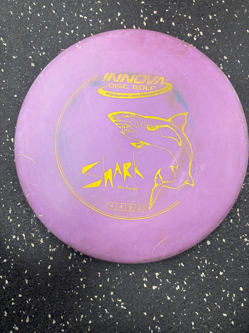 Vist Large View of Product Image Which is Used Innova DX SHARK Disc Golf Mid Range Purple