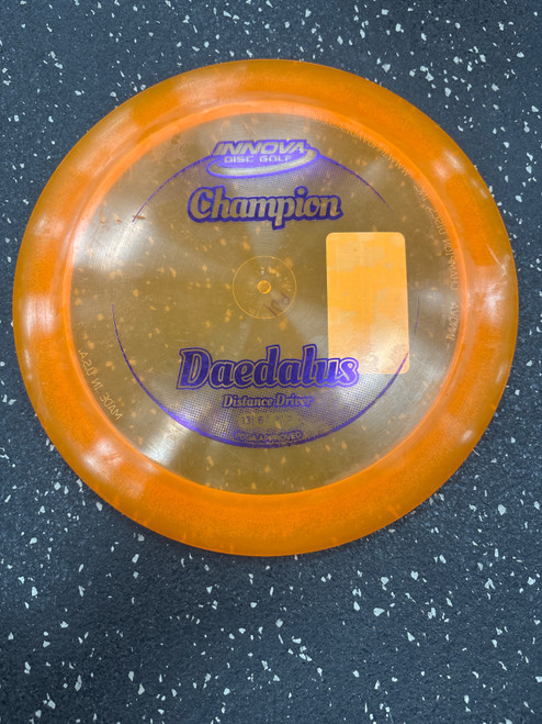 Vist Large View of Product Image Which is Used Innova CHAMPION DAEDALUS Disc Golf Driver Orange