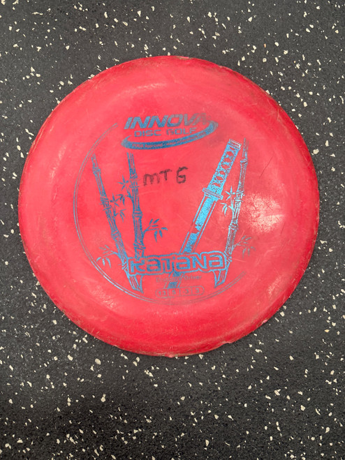 Vist Large View of Product Image Which is Used Innova DX KATANA Disc Golf Driver Red