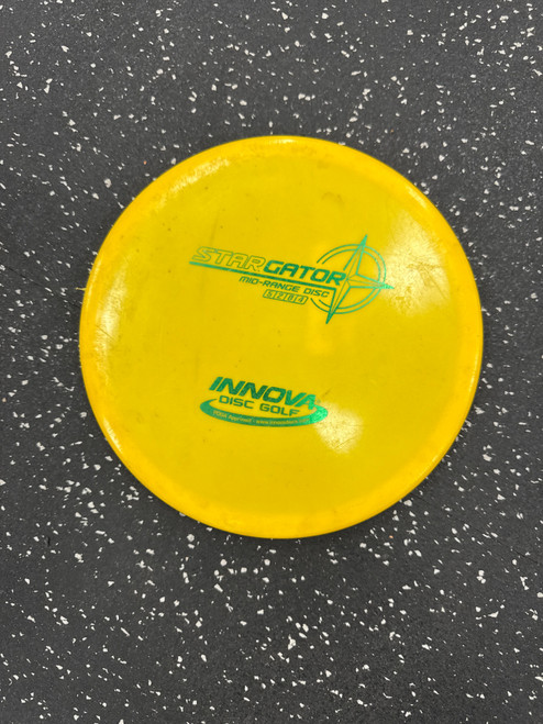 Vist Large View of Product Image Which is Used Innova STAR GATOR Disc Golf Mid Range Yellow