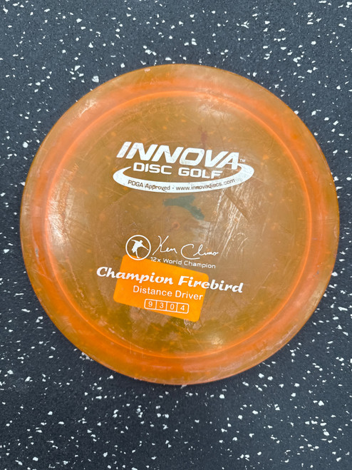 Vist Large View of Product Image Which is Used Innova CHAMPION FIREBIRD Disc Golf Driver Orange