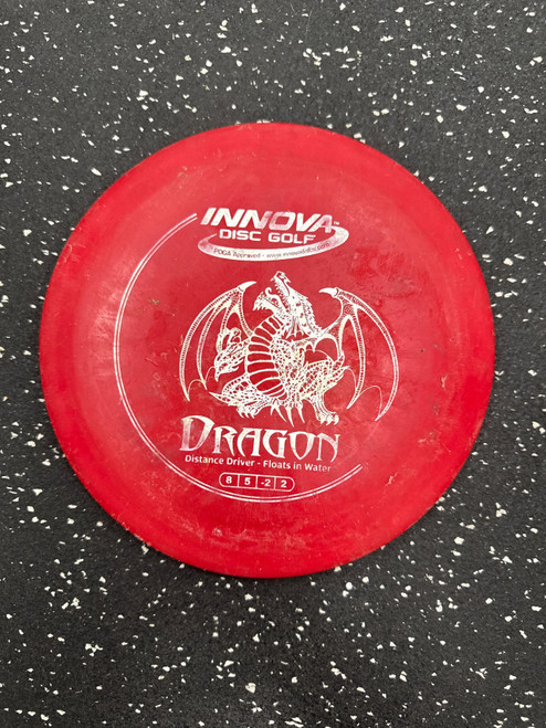 Vist Large View of Product Image Which is Used Innova DX DRAGON Disc Golf Driver Red
