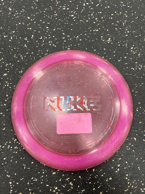 Vist Large View of Product Image Which is Used Discraft Z NUKE Disc Golf Driver Purple