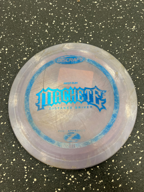 Vist Large View of Product Image Which is Used Discraft Z MACHETE FIRST RUN Disc Golf Driver Purple