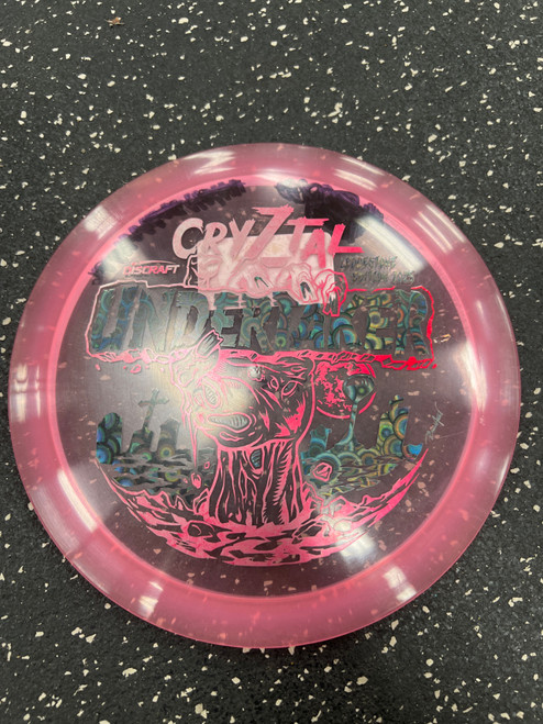 Vist Large View of Product Image Which is Used Discraft CRYZTAL UNDERTAKER Disc Golf Driver Pink