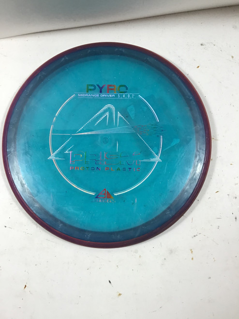 Vist Large View of Product Image Which is Used Axiom PRISM PROTON PYRO Disc Golf Mid Range Royal Blue 180g