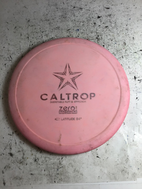 Vist Large View of Product Image Which is Used Latitude 64 ZERO MED CALTROP Disc Golf Putter Pink 172g